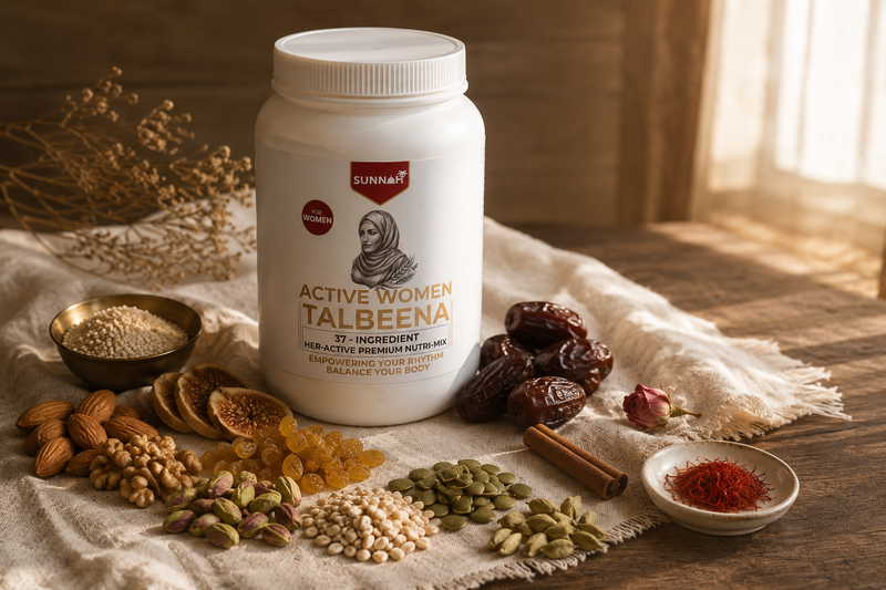 Sunnah Grains Active Women Talbeena jar on linen, surrounded by almonds, walnuts, pistachios, dried figs, dates, pumpkin seeds, sesame, saffron and cinnamon